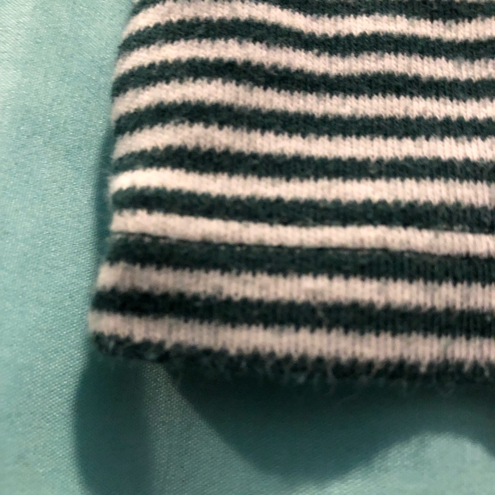 Green and white turtleneck